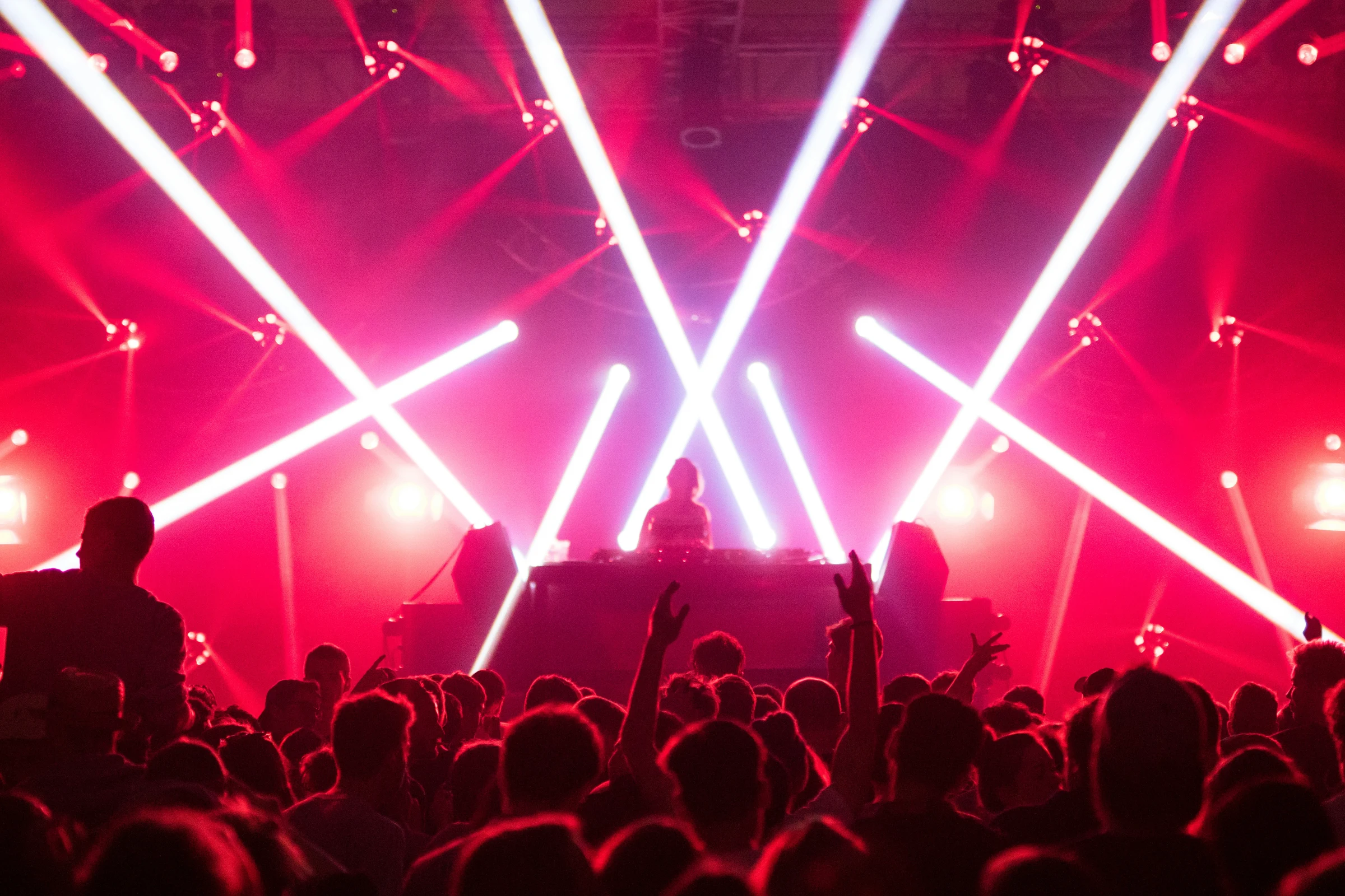 Crowd at a club night with stage lighting