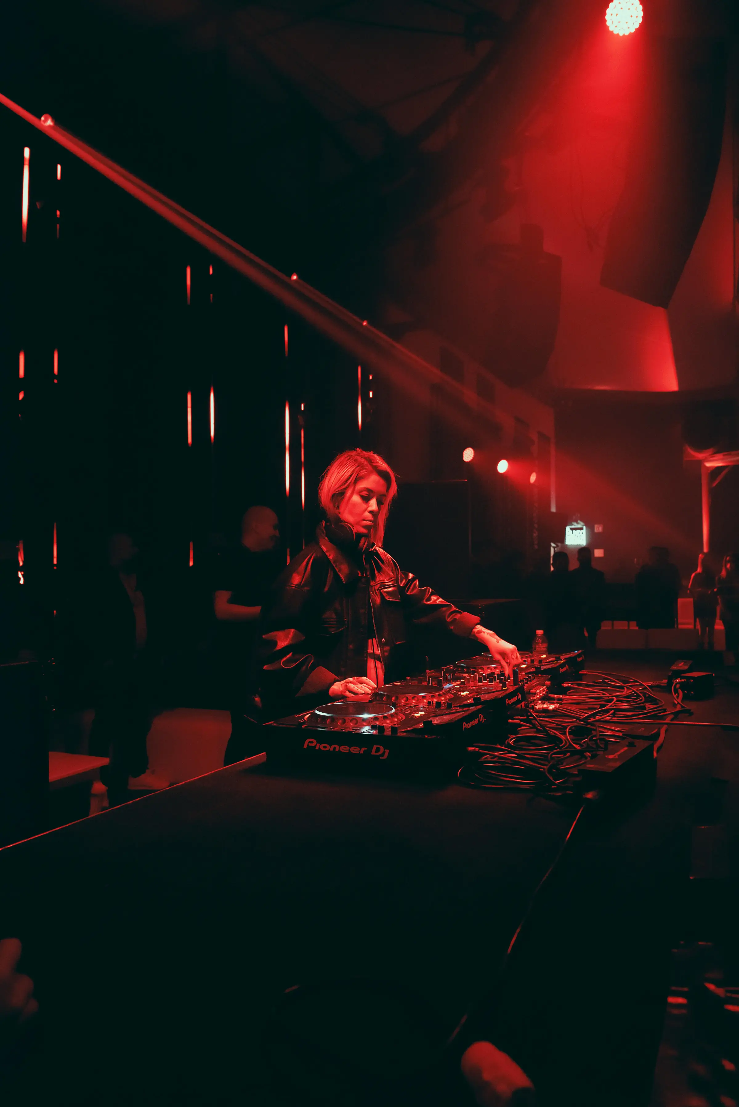 Crowd at a club night with stage lighting